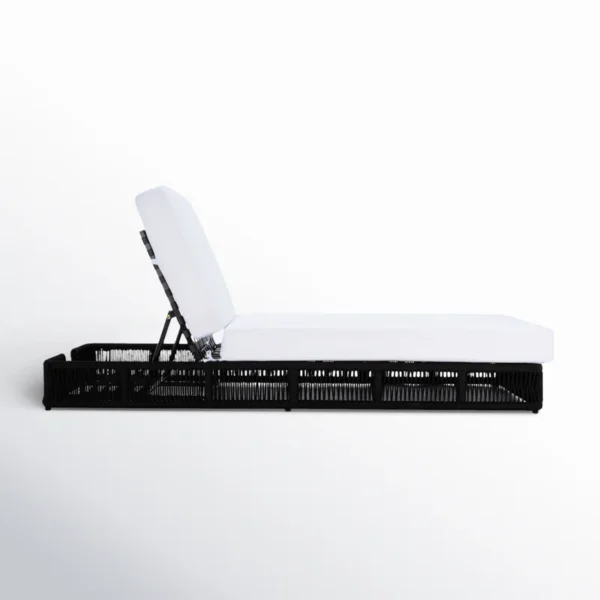 Black rope sun lounger with soft white cushion for outdoor use