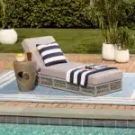 Grey rope sun lounger with soft grey cushion for outdoor use.