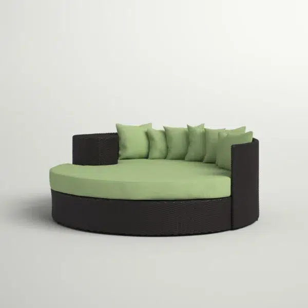 Black and Siya green HDPE wicker outdoor patio daybed with cushions, perfect for lounging in the garden or patio.