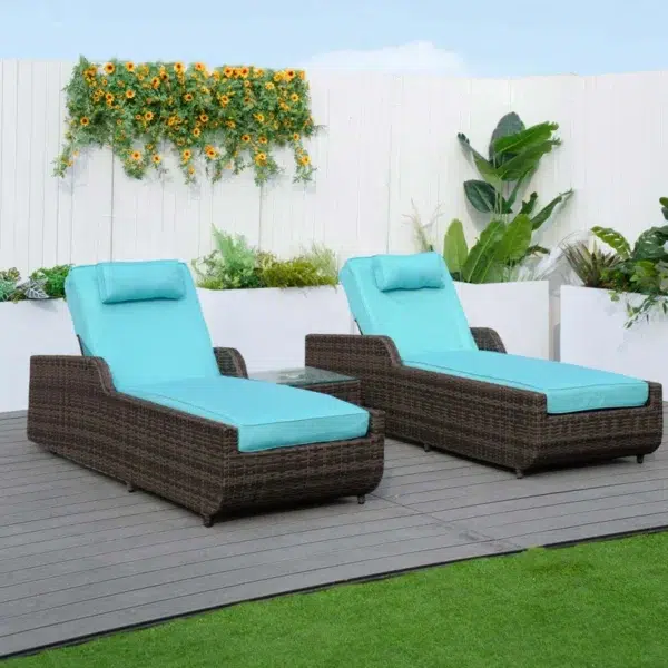 Dark brown rattan outdoor reclining chaise lounge with sky blue cushions.