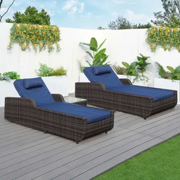 Dark brown rattan outdoor reclining chaise lounge with blue cushions