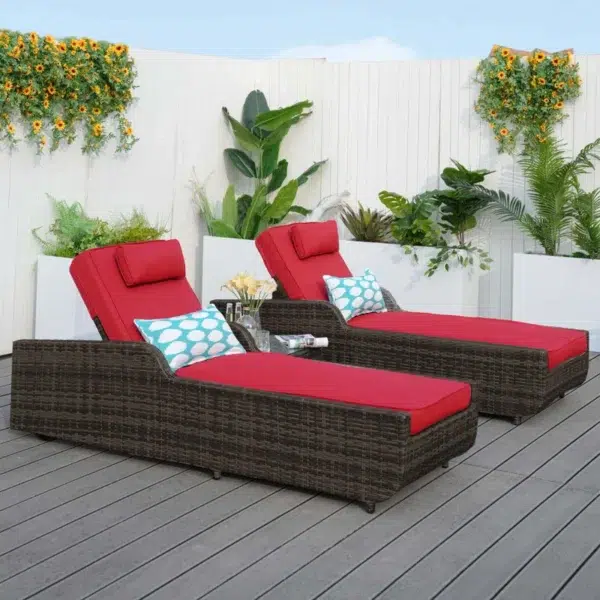 Dark brown rattan outdoor reclining chaise lounge with sky blue cushions.