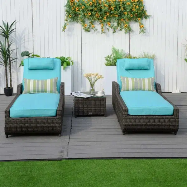 Dark brown rattan outdoor reclining chaise lounge with sky blue cushions.