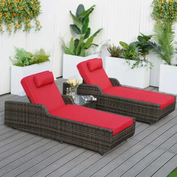Dark brown rattan outdoor reclining chaise lounge with sky blue cushions.