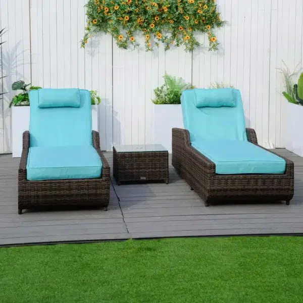 Dark brown rattan outdoor reclining chaise lounge with sky blue cushions.