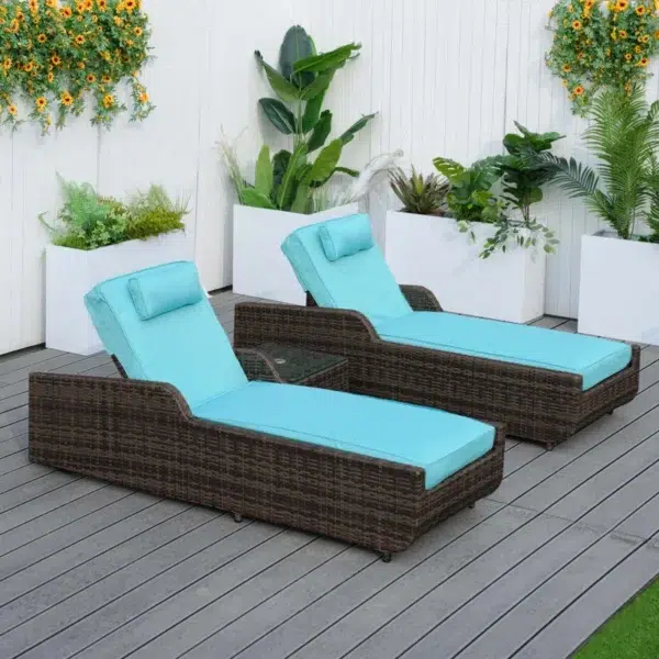 Dark brown rattan outdoor reclining chaise lounge with sky blue cushions.