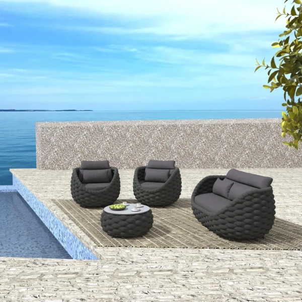 Rope 4-piece patio conversation sofa set with cushions, perfect for outdoor relaxation.