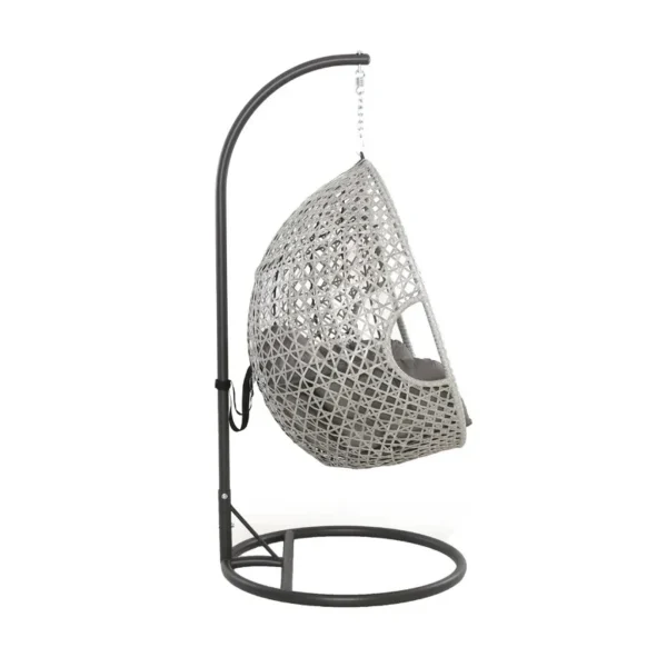 Single seater hanging swing with silver frame and grey cushioned seat placed in a garden.