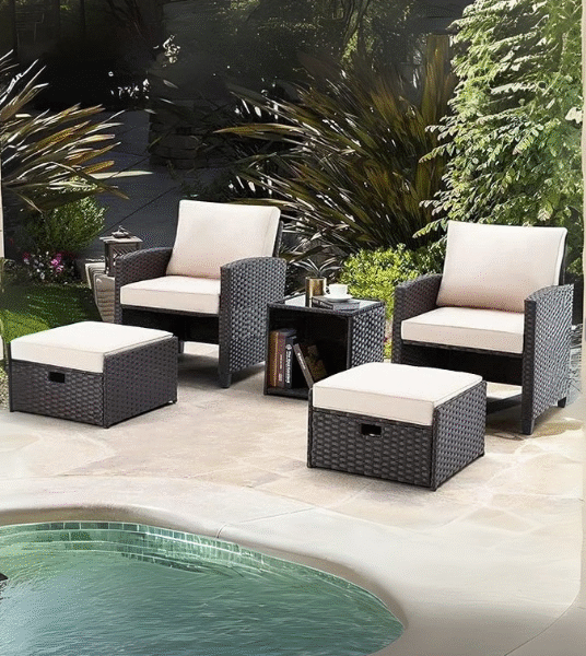 5 piece patio furniture set with black wicker frame, grey cushions, and matching ottoman, perfect for outdoor spaces.
