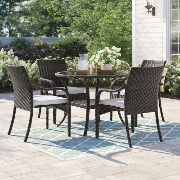 4-person round outdoor dining set with dark brown frame, grey cushioned seats, perfect for garden or patio.