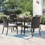 4-person round outdoor dining set with dark brown frame, grey cushioned seats, perfect for garden or patio.