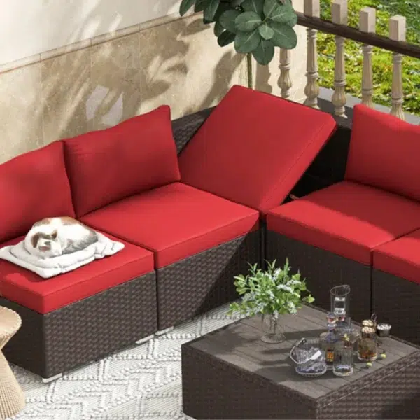 6 seater outdoor rattan wicker sofa set with red cushions and brown center table for patio or garden