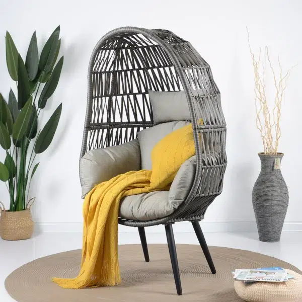 Single seater grey swing basket with sturdy frame, perfect for balcony or garden seating.