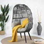 Single seater grey swing basket with sturdy frame, perfect for balcony or garden seating.