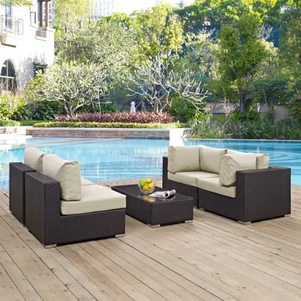 "4 pcs waterproof patio wicker furniture set with cushioned seats and glass-top table for outdoor spaces