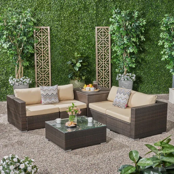 4-piece outdoor wicker patio sofa set with cushioned seating, glass coffee table, and side table for garden or backyard relaxation"