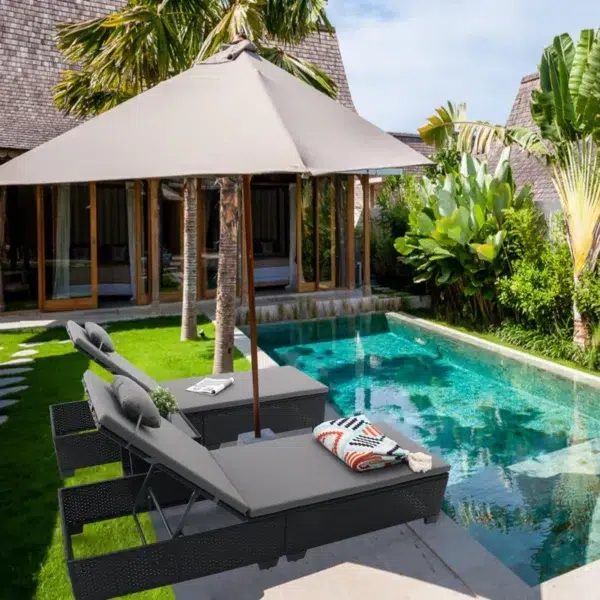 Modern outdoor poolside loungers with adjustable backrest, weather-resistant frame, and cushioned seating for luxury relaxation.
