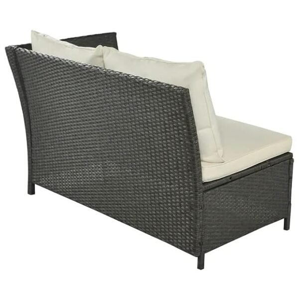 Outdoor rattan wicker sofa set with beige cushions and matching center table on a patio
