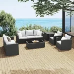 "6 pcs wicker conversational sofa set with cushioned seating and center glass-top table for poolside relaxation"