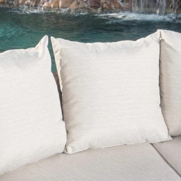 Outdoor rattan wicker full moon sofa set with cushions on a garden patio