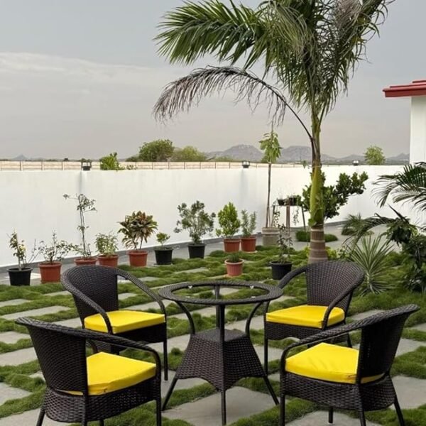 Modern outdoor chair and coffee table set for patio, balcony, or garden seating.