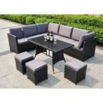 Modern outdoor rattan wicker patio set with cushioned chairs, glass-top coffee table, and weatherproof design for garden or balcony.