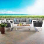 Outdoor rope sofa set with cushioned seating in modern patio setting