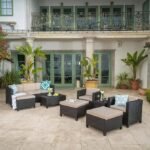 "Modern outdoor rattan wicker patio furniture set with cushioned seating and glass-top table, perfect for garden, balcony, or backyard."