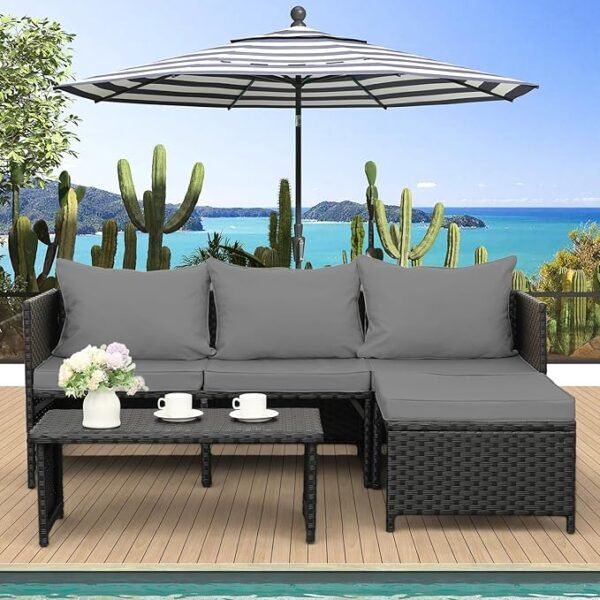 Outdoor sofa set with cushioned seats on a garden patio, weather-resistant wicker frame, and stylish modern design.