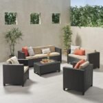 "Modern outdoor rattan wicker patio furniture set with cushioned seating and glass-top table, perfect for garden, balcony, or backyard."