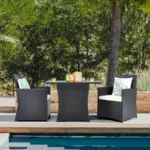 Two rectangular outdoor dining cushions in neutral tones, designed for patio furniture