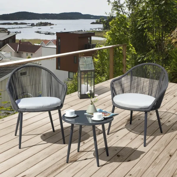 3-piece outdoor patio bistro set with rope detailing and comfortable cushions, featuring two chairs and a round table