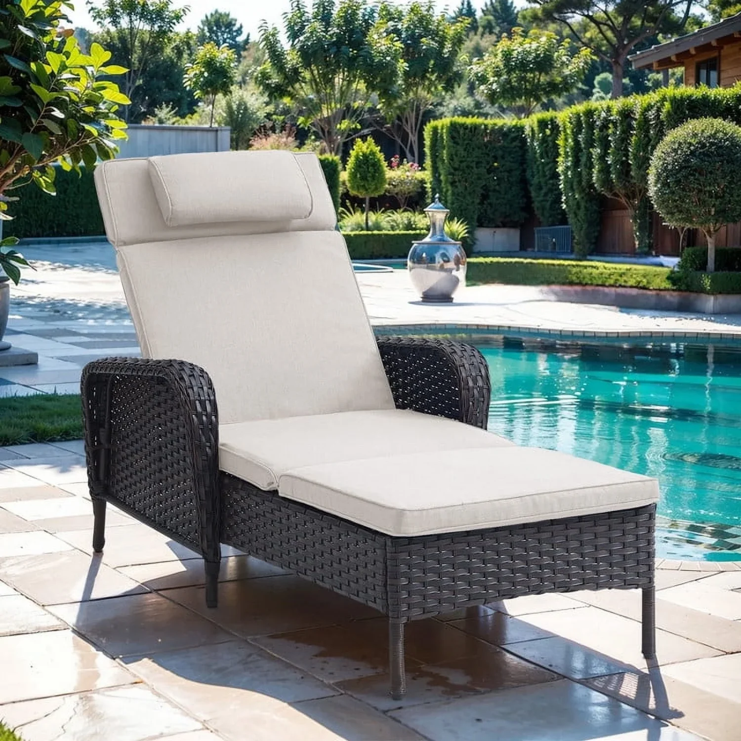 Off-white outdoor poolside reclining chaise lounge chair with cushioned seat.