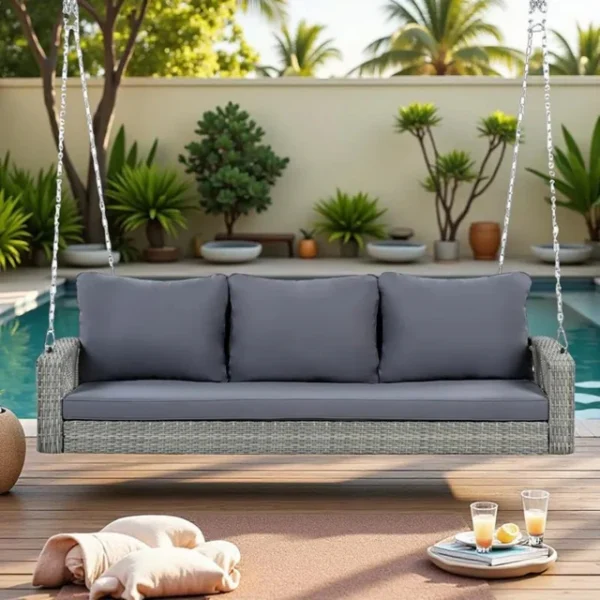 Outdoor 3-person porch swing made of durable HDPE wicker with comfortable cushions