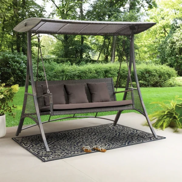 3-seat outdoor rattan wicker patio swing chair with beige cushions and adjustable canopy shade