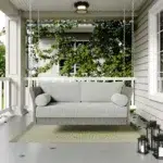 Outdoor rattan wicker hanging swing chair with soft cushion for patio or garden relaxation
