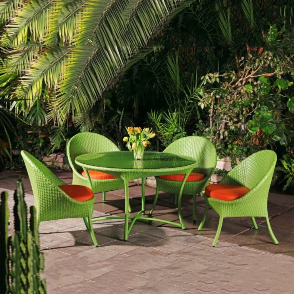 Outdoor all-weather resistant rattan wicker 5-piece dining set with table and chairs for patio or garden use.