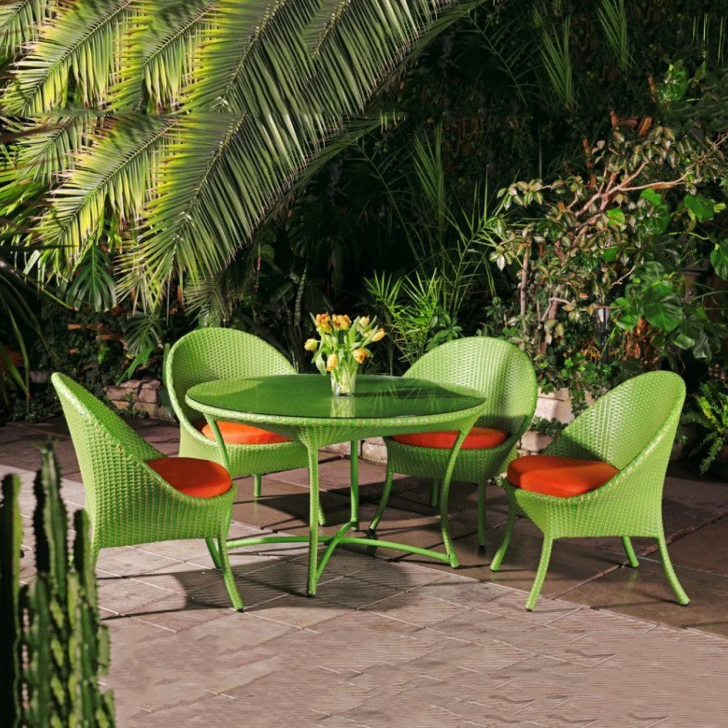 Outdoor all-weather resistant rattan wicker 5-piece dining set with table and chairs for patio or garden use.