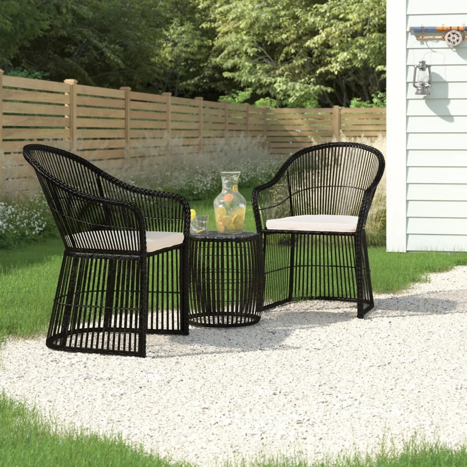 3-piece outdoor rattan wicker patio set with cushioned seats and table