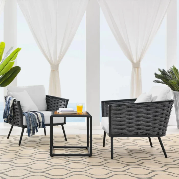 Outdoor rope 3-piece patio furniture set with wooden top table and cushioned chairs