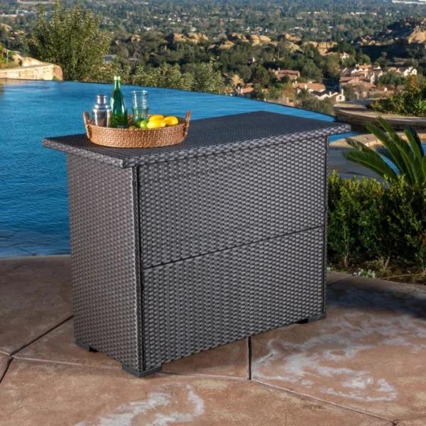 Outdoor rattan wicker bar table with built-in storage shelves for patio and backyard entertaining.