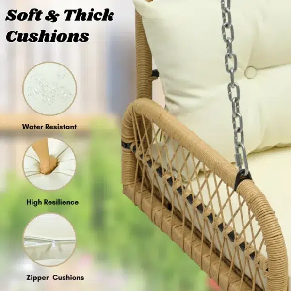 Outdoor beige rattan wicker two-seater sofa swing with cushions for patio or garden