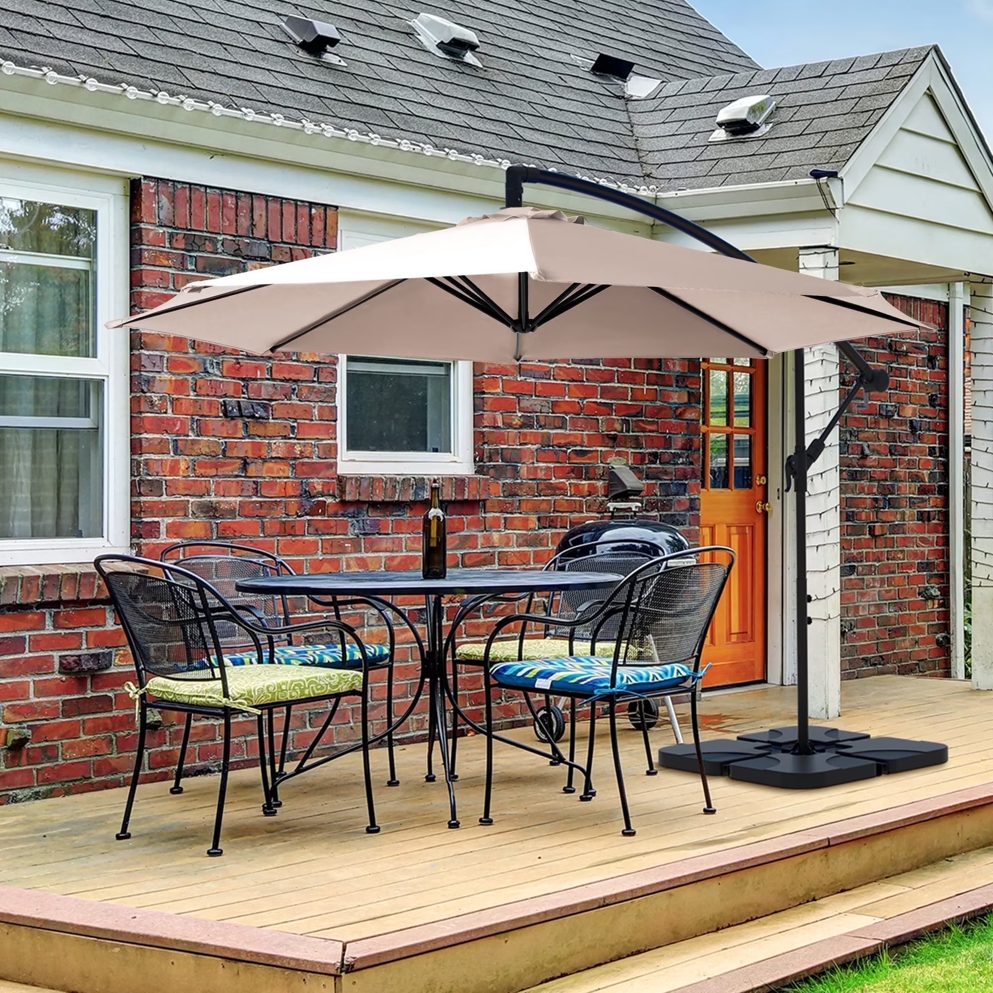 “Large outdoor patio umbrella providing shade for garden and deck”
