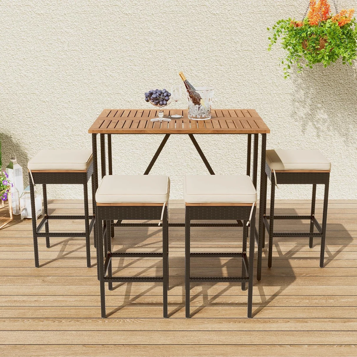 Stylish 5-piece outdoor wicker bar set with wooden top table and cushioned stools on a wooden deck