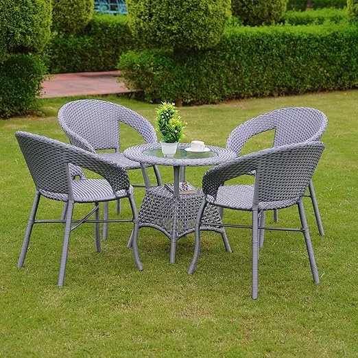 “5-piece outdoor rattan wicker patio bistro set with 4 cushioned chairs and a glass-top table for garden, balcony, or terrace seating”
