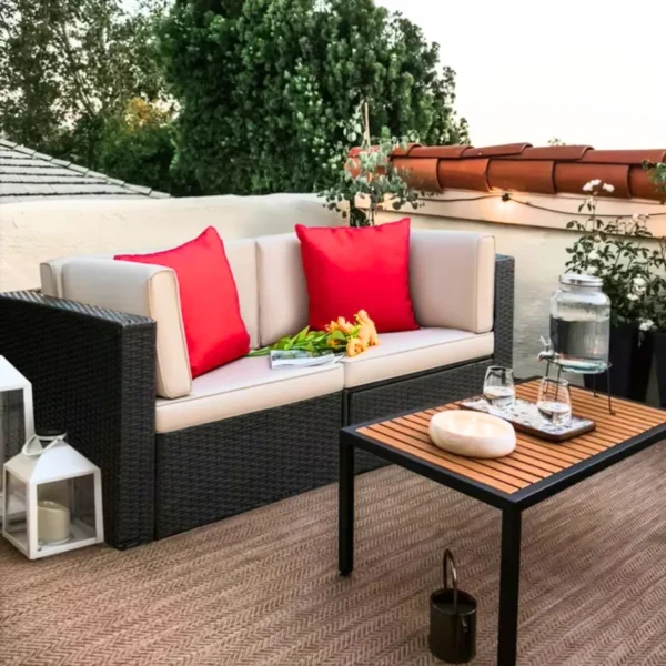 Outdoor all-weather rattan wicker double seater sofa with comfortable cushions, perfect for patio, balcony, or garden seating.
