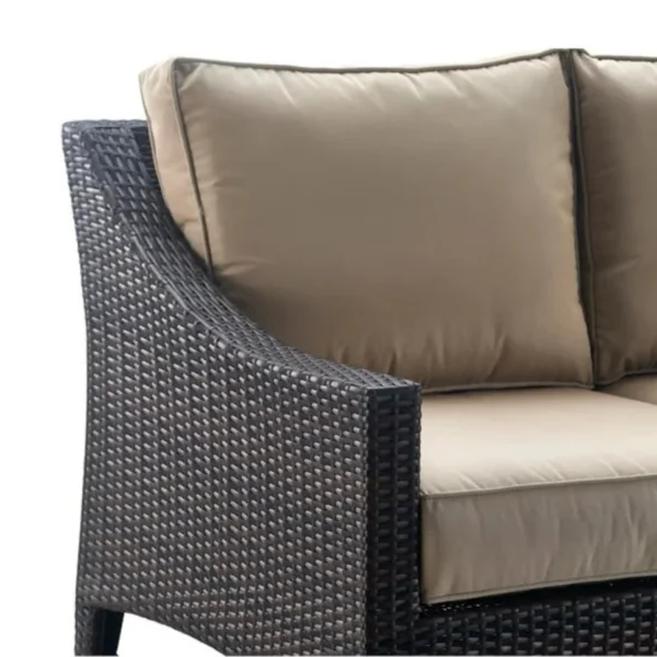 Stylish outdoor rattan wicker loveseat sofa with soft cushions, perfect for patio or garden seating.