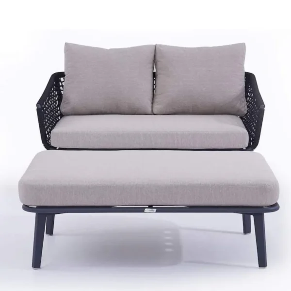 2-piece outdoor rope loveseat sofa with matching ottoman on a patio, featuring weather-resistant cushions
