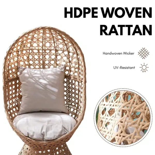 Beige rattan wicker cocoon chair with a comfortable cushion for outdoor patio or garden