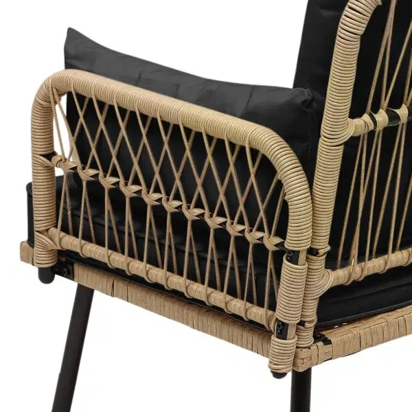 “Stylish outdoor rattan wicker loveseat sofa with soft beige cushions on a patio setup”